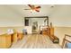 Bonus room featuring wood floors and access to an additional room at 5175-5185 Simms Pl, Wheat Ridge, CO 80033