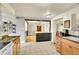 View of the kitchen layout with a tiled island at 5175-5185 Simms Pl, Wheat Ridge, CO 80033