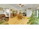 Spacious living room with hardwood floors and multiple windows for ample natural light at 5175-5185 Simms Pl, Wheat Ridge, CO 80033
