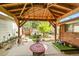 Backyard patio featuring wood beam overhang at 5175-5185 Simms Pl, Wheat Ridge, CO 80033