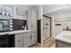 Nicely remodeled bathroom featuring a stand up shower and vanity with vanity lighting at 5300 Tabor St, Arvada, CO 80002