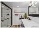 Beautiful bathroom with subway tile shower and marble countertop at 5300 Tabor St, Arvada, CO 80002