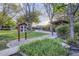 Beautiful community park featuring a little free library, lush greenery, and scenic walking paths at 5300 Tabor St, Arvada, CO 80002
