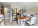 Bright office space with built-in shelving, a desk, and mirrored closet at 5300 Tabor St, Arvada, CO 80002