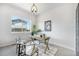 Bright home office space with a large window and neutral decor at 9051 E 61St Ave, Denver, CO 80238