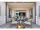 Cozy outdoor patio with a fire pit, perfect for entertaining and relaxation at 9051 E 61St Ave, Denver, CO 80238