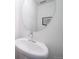 Modern bathroom with a pedestal sink and chrome faucet at 46559 Avery Ln, Bennett, CO 80102