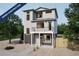 Two-story home featuring modern design, large windows, and balcony, under construction at 46559 Avery Ln, Bennett, CO 80102