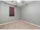 Simple bedroom with carpet flooring and a window with blinds at 14442 E 102Nd Pl, Commerce City, CO 80022