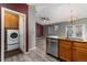 Convenient laundry room with washer and dryer included at 14442 E 102Nd Pl, Commerce City, CO 80022