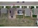 Bird's-eye view of the home with solar panels, backyard patio set, and trampoline in the yard at 7414 Blue River Ave, Frederick, CO 80530