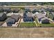 Aerial view of a home with fenced yard and patio, set in a well-planned community at 7414 Blue River Ave, Frederick, CO 80530