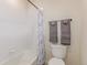 Neat bathroom features a shower and tub combination at 7414 Blue River Ave, Frederick, CO 80530