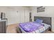 Bedroom with closet, comfy bed, and decor, creating a relaxing retreat at 7414 Blue River Ave, Frederick, CO 80530