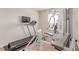 Home gym offers workout equipment, perfect for fitness enthusiasts at 7414 Blue River Ave, Frederick, CO 80530