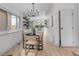 Cozy dining room featuring modern chandelier, open layout, and an inviting atmosphere at 3619 N York St, Denver, CO 80205