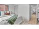 Bright main bedroom features hardwood floors, large window and closet at 3619 N York St, Denver, CO 80205