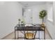 Bright office space with desk, chair, modern decor and egress window at 3619 N York St, Denver, CO 80205