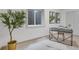 Office space with a desk, chair, modern decor and egress window at 3619 N York St, Denver, CO 80205