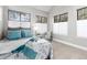 Bedroom with two windows and decorative furniture at 4713 Spine Rd # D, Boulder, CO 80301