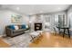 Bright living room with hardwood floors, fireplace, and ample natural light at 4713 Spine Rd # D, Boulder, CO 80301