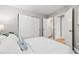 Bedroom with ensuite bath, closet, and hall access at 4713 Spine Rd # D, Boulder, CO 80301