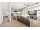 Inviting living room with a staircase, leading to the cozy upstairs area at 9752 Dahlia Ln, Thornton, CO 80229
