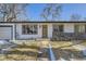 Inviting single-story home with brick accents, a well-manicured lawn, and a clear walkway to the front door at 2582 S Birch St, Denver, CO 80222