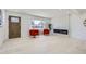 Bright living room featuring a modern fireplace and ample natural light at 2582 S Birch St, Denver, CO 80222