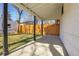 Cozy back patio with wooden fence and concrete flooring and view of the backyard at 1317 Monroe St, Denver, CO 80206