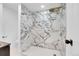 Bathroom featuring white and gray marble tile in the shower at 1317 Monroe St, Denver, CO 80206