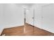 Light-filled bedroom with hardwood floors and white trim at 1317 Monroe St, Denver, CO 80206