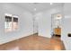 Bright bedroom with hardwood floors and plenty of light throughout the room at 1317 Monroe St, Denver, CO 80206