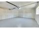 A clean slate awaits in the garage with its painted walls and epoxy flooring at 1317 Monroe St, Denver, CO 80206