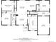 Floorplan showing layout of living room, kitchen, bedrooms, bathrooms, entry, and garage spaces at 4685 Wadsworth Blvd, Wheat Ridge, CO 80033