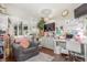 Cozy home office featuring a chair, workspace, desk, and wall decorations at 4685 Wadsworth Blvd, Wheat Ridge, CO 80033