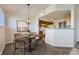 Dining area featuring modern light fixture, room to entertain and open floorplan at 5705 N Genoa Way # 308, Aurora, CO 80019