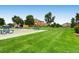 Large green space featuring picnic tables at 5705 N Genoa Way # 308, Aurora, CO 80019