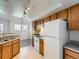 Functional kitchen with plenty of counter space and natural light, all appliances included at 5705 N Genoa Way # 308, Aurora, CO 80019