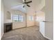 Bright living room with fireplace and vaulted ceilings showcasing ample space at 5705 N Genoa Way # 308, Aurora, CO 80019