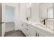 Modern bathroom featuring double vanity with quartz countertop and sleek bronze faucets at 30355 E 161St Ave, Brighton, CO 80603