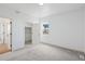Carpeted bedroom with closet and natural light at 30355 E 161St Ave, Brighton, CO 80603