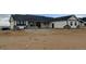 Spacious single-story home with a covered patio and a serene, expansive yard at 30355 E 161St Ave, Brighton, CO 80603