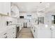 Bright kitchen with stainless appliances, quartz countertops and island at 30355 E 161St Ave, Brighton, CO 80603