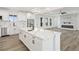 Spacious, open kitchen with large island, stainless steel appliances, and lots of light at 30355 E 161St Ave, Brighton, CO 80603
