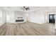 Bright, open living room with fireplace and adjacent entrance at 30355 E 161St Ave, Brighton, CO 80603
