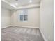 Neutral bedroom with carpet and a window providing natural light at 5930 S Platte Canyon Dr, Littleton, CO 80123
