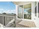 Inviting outdoor deck with sliding glass doors leading to a bright dining area at 5930 S Platte Canyon Dr, Littleton, CO 80123