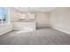 Modern kitchenette features bright cabinetry and recessed lighting at 5930 S Platte Canyon Dr, Littleton, CO 80123