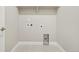 Functional laundry room space with utility connections and ample room for appliances at 5930 S Platte Canyon Dr, Littleton, CO 80123